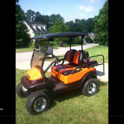 Orange and Purple Street Legal Golf Cart