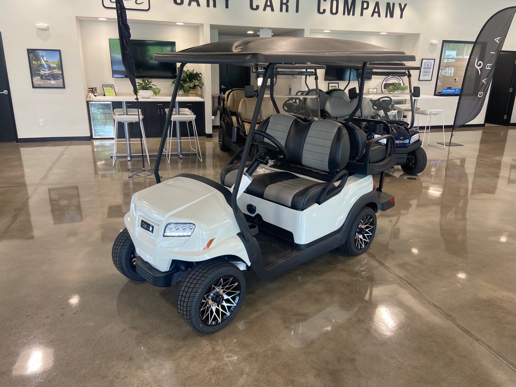 Metallic Glacier White Club Car Onward