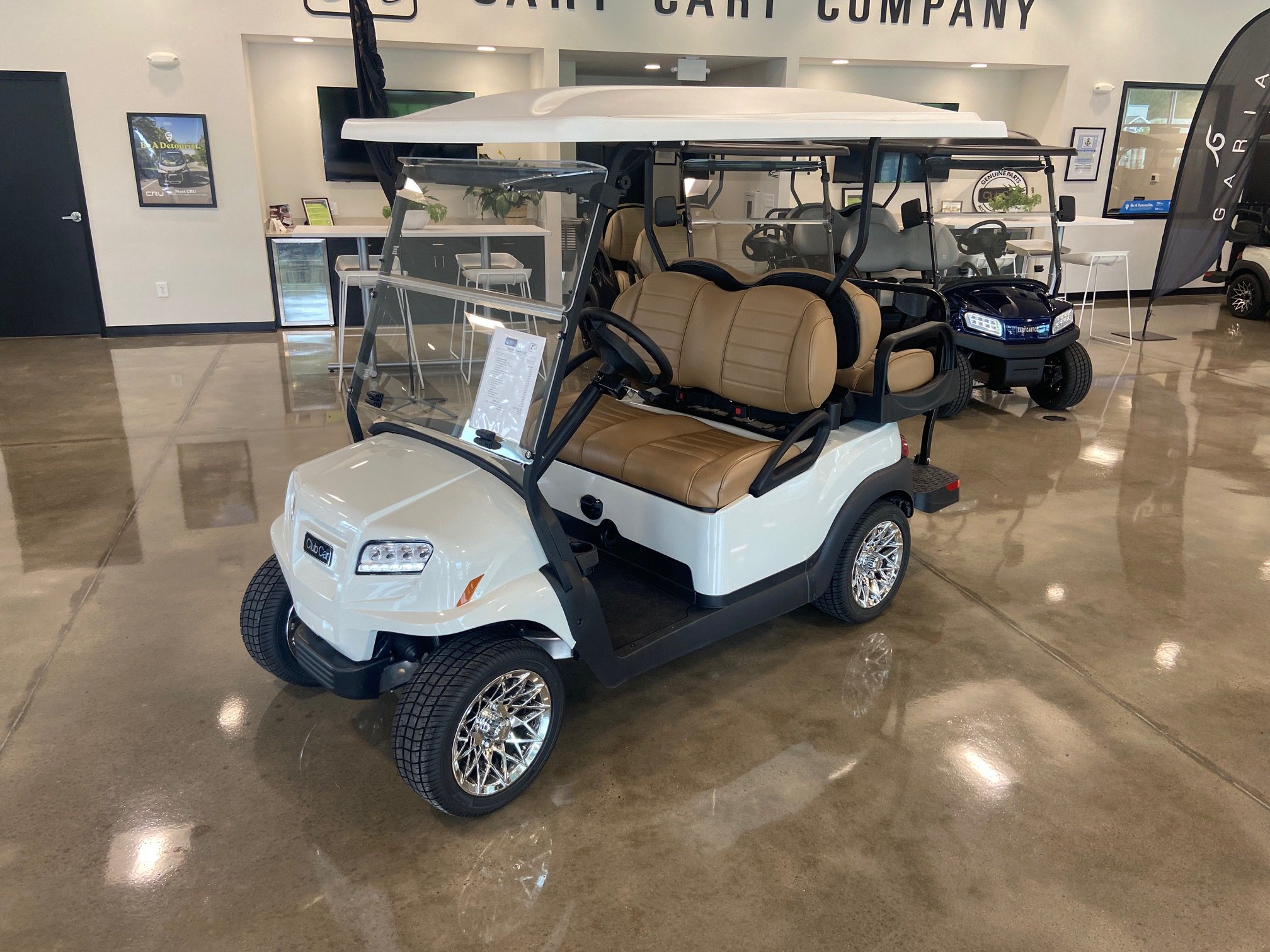 Metallic Glacier White Club Car Onward