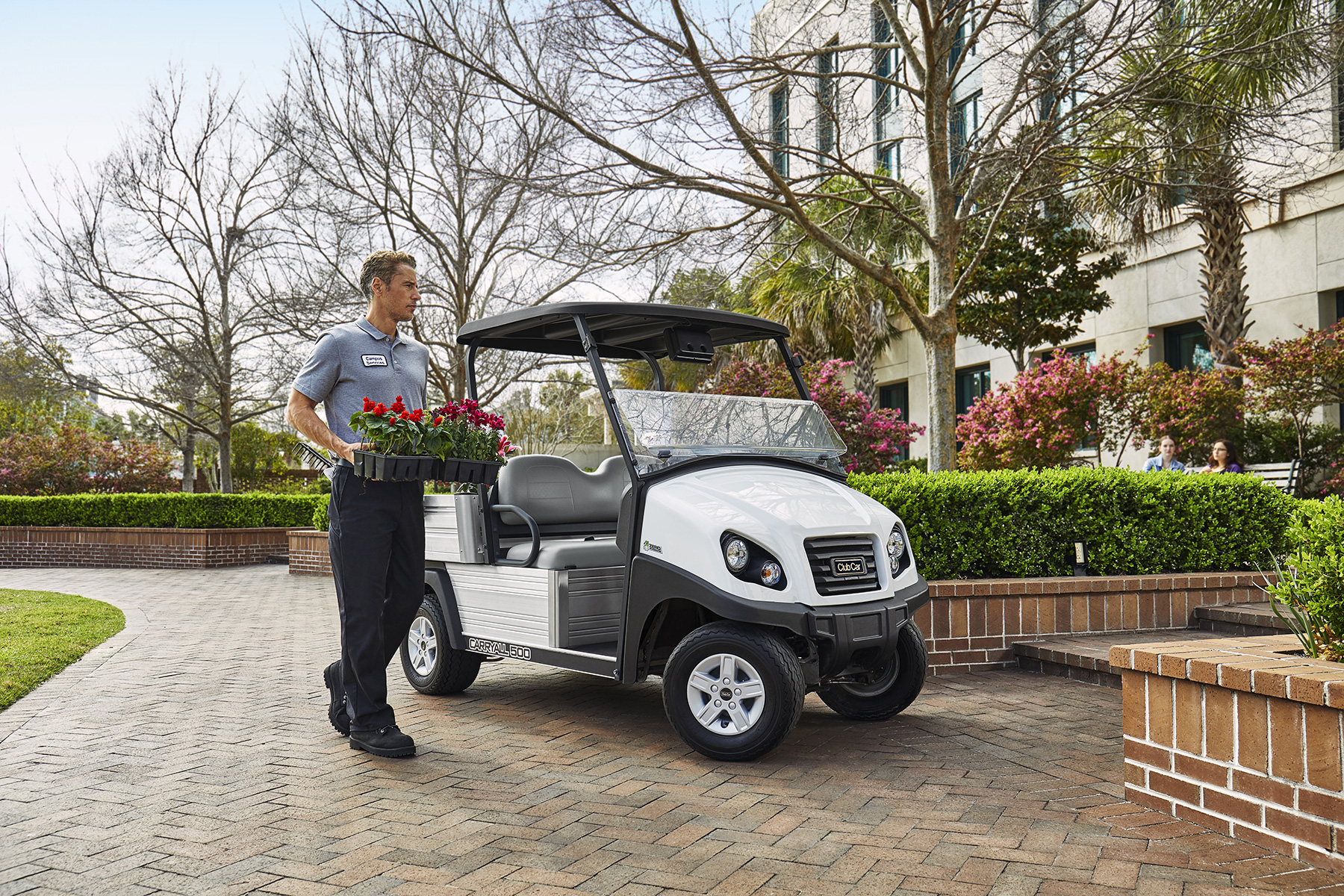 Man working with Carryall 500 Charleston cart